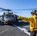 UH-60 Black Hawks from the Army’s 2-2 Assault Helicopter Battalion Conduct Deck Landing Qualifications aboard USS Milius (DDG 69)