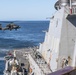 UH-60 Black Hawks from the Army’s 2-2 Assault Helicopter Battalion Conduct Deck Landing Qualifications aboard USS Milius (DDG 69)