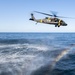 UH-60 Black Hawks from the Army’s 2-2 Assault Helicopter Battalion Conduct Deck Landing Qualifications aboard USS Milius (DDG 69)