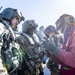 UH-60 Black Hawks from the Army’s 2-2 Assault Helicopter Battalion Conduct Deck Landing Qualifications aboard USS Milius (DDG 69)