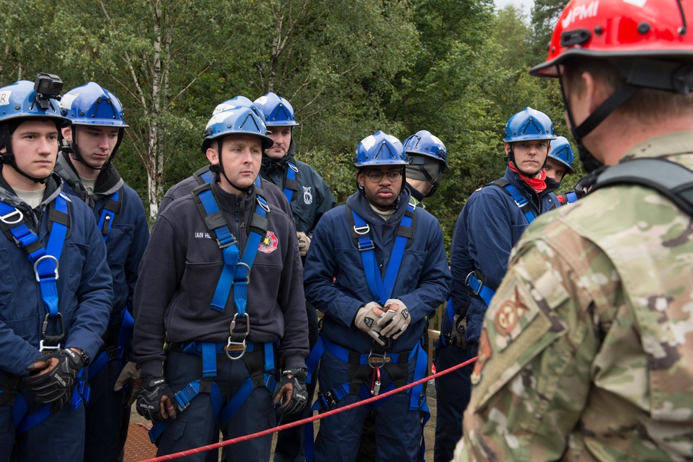 Firefighters qualify on rescue techniques during rescue technician course