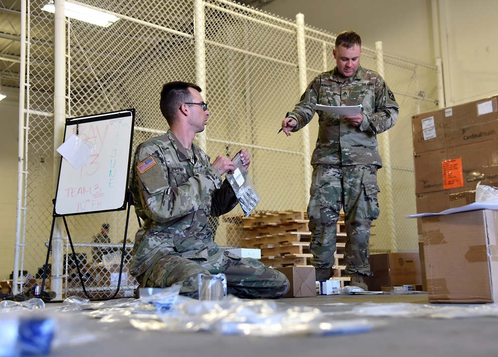 Soldiers inventory new medical equipment