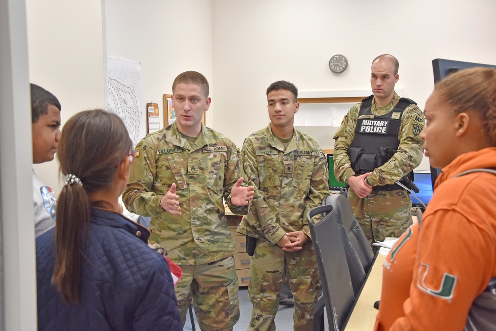 Middle school students visit police and fire stations