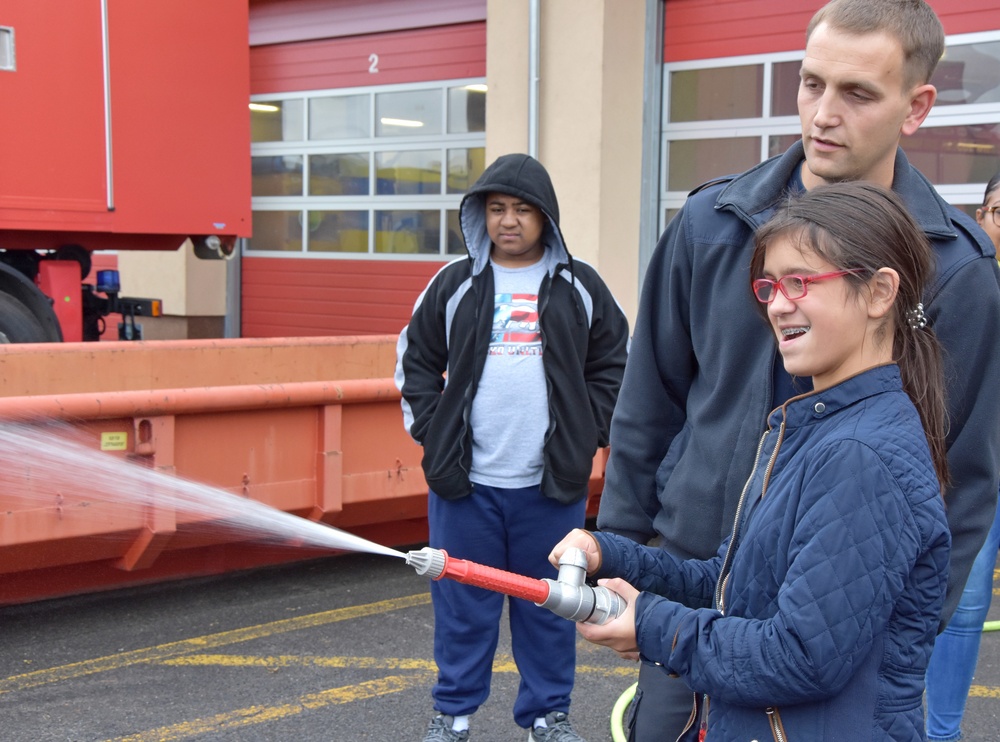 Middle school students visit police and fire stations