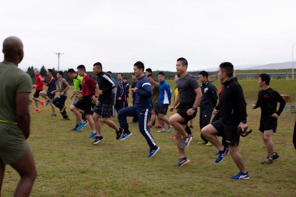 JGSDF service members execute Marine Corps physical training