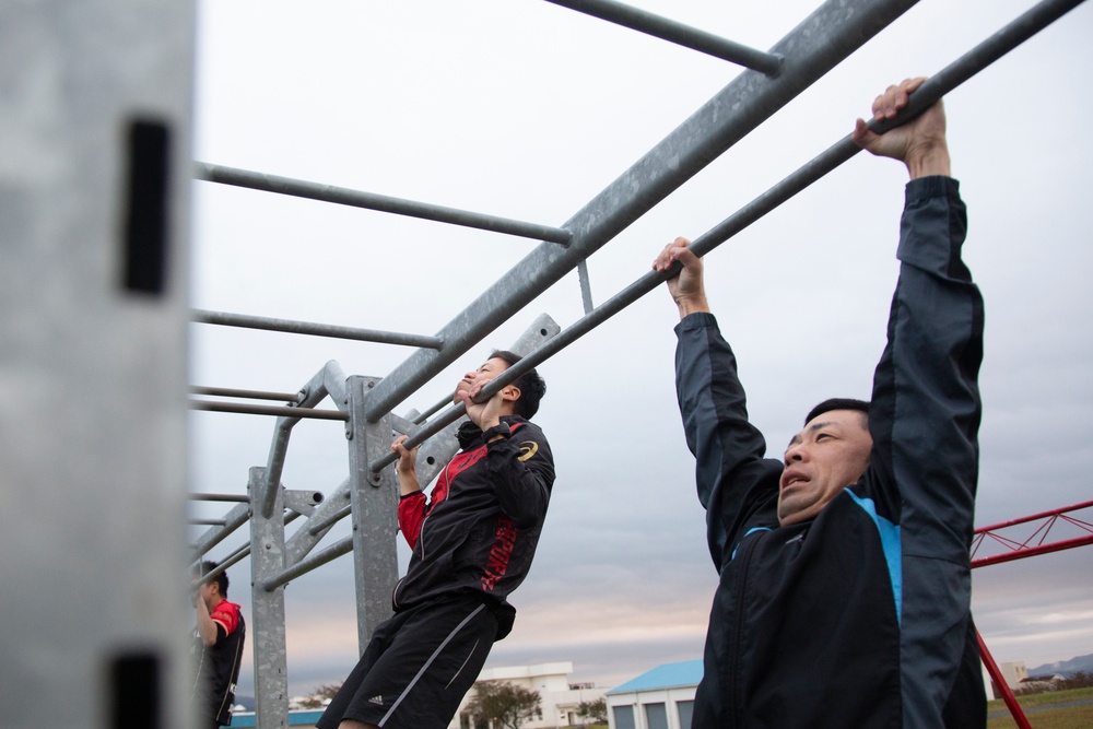 JGSDF service members execute Marine Corps physical training