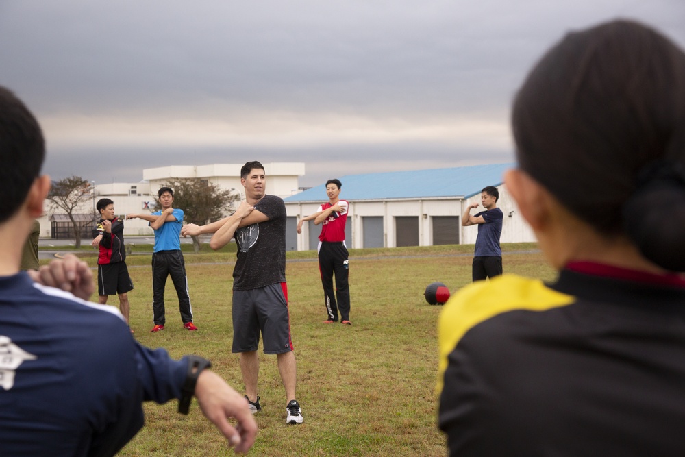 JGSDF service members execute Marine Corps physical training