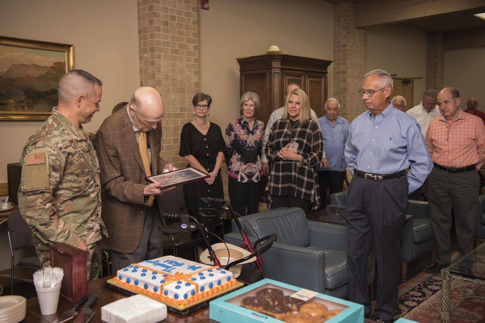Members of The Bank and Trust celebrate Laughlin's lifetime supporter