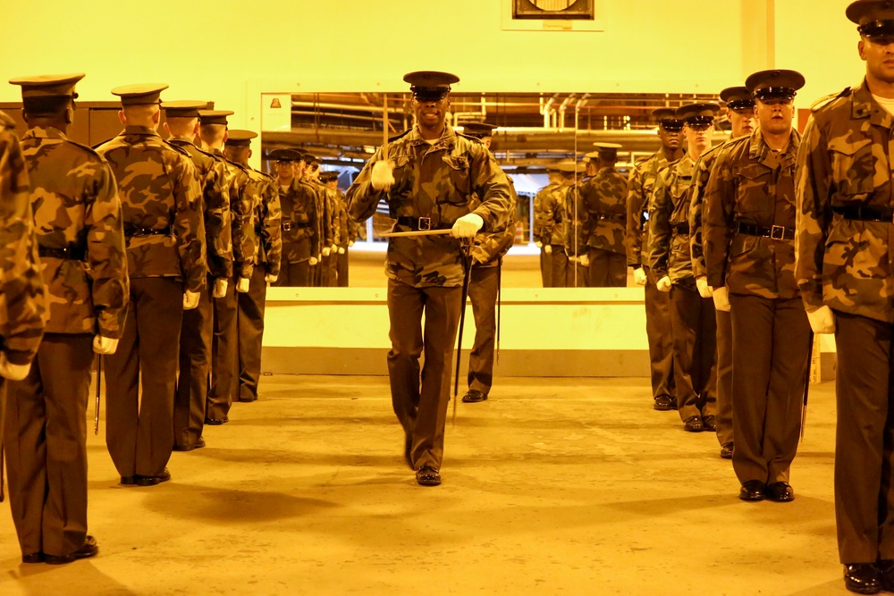 Marines practice drill during Ceremonial Drill School