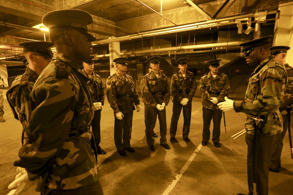 Marines practice drill during Ceremonial Drill School