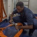 GHWB Sailor Performs Maintenance