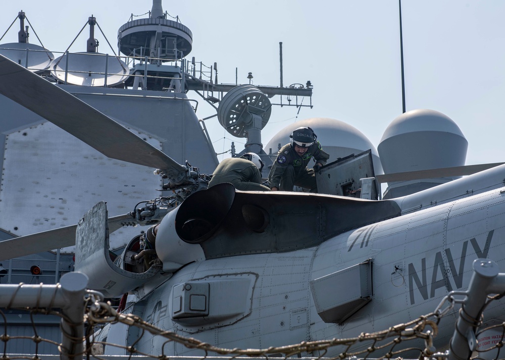USS Normandy Sailor Preforms Pre-Flight Checks