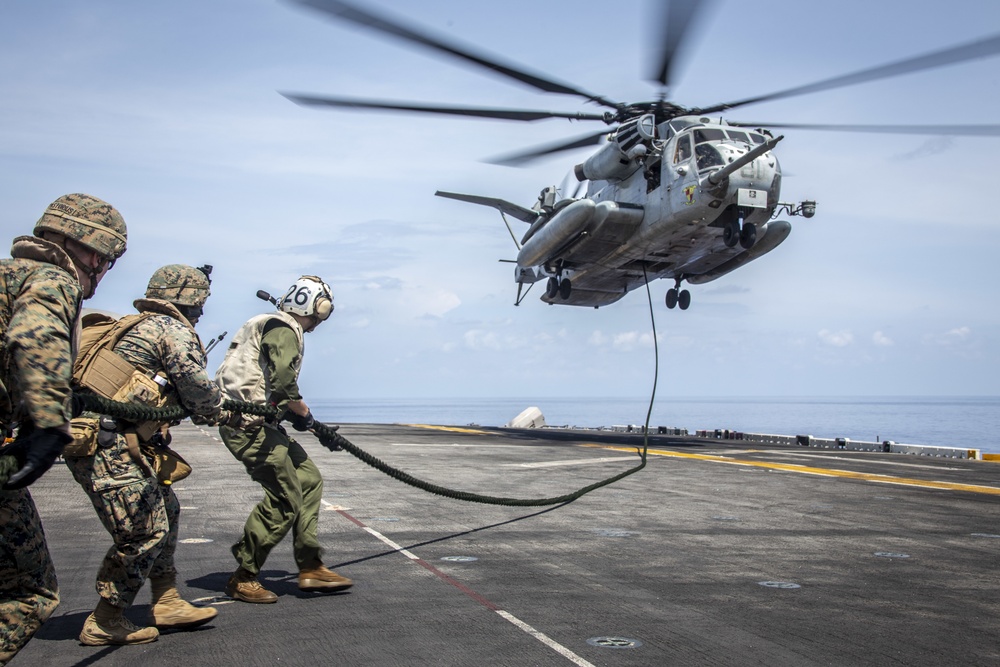 Kilo Company, Battalion Landing Team 3/5 fast-roping on the USS Boxer