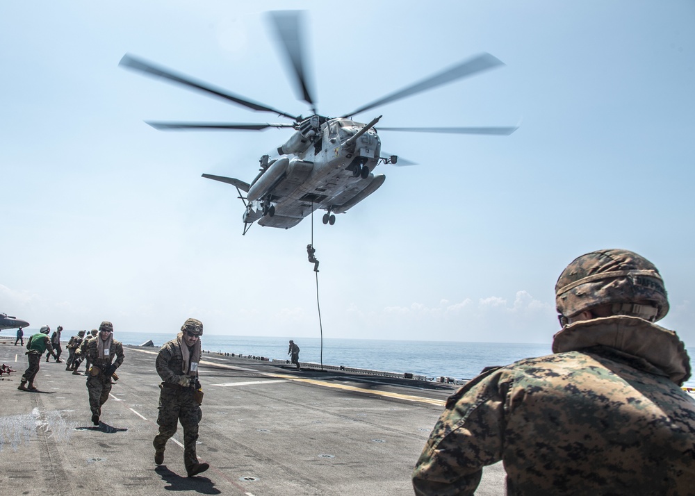 Kilo Company, Battalion Landing Team 3/5 fast-roping on the USS Boxer