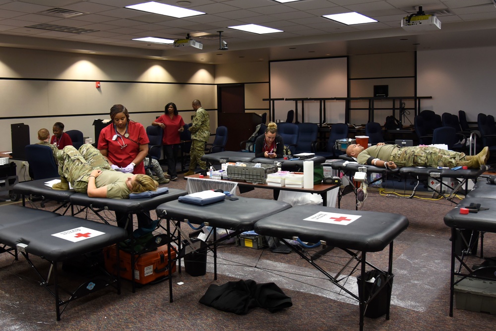 USAF EC gives blood in memory of teammate