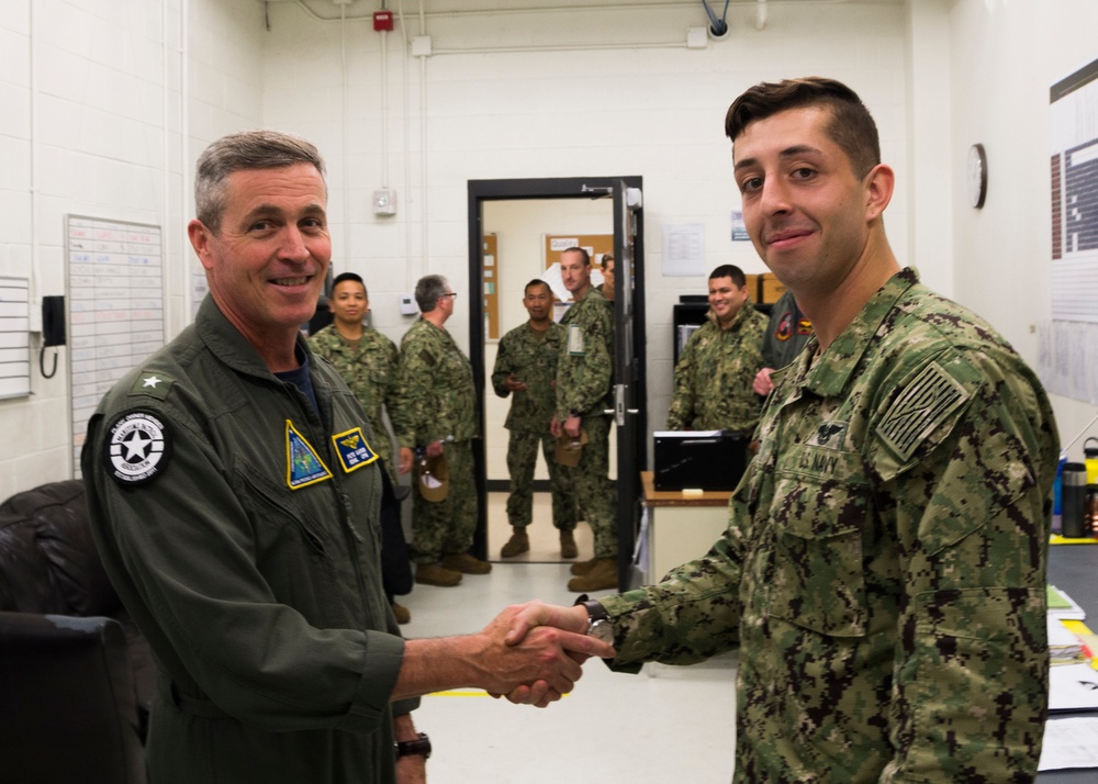 Rear Admiral Peter Garvin, commander, Patrol Reconnaissance Group. visits with Patrol Squadron 46