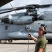 Marines with HMH-366 maintain CH-53E Super Stallion helicopters