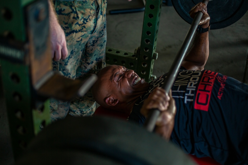 Marines, Sailors participate in a bench press competition during exercise KAMANDAG 3