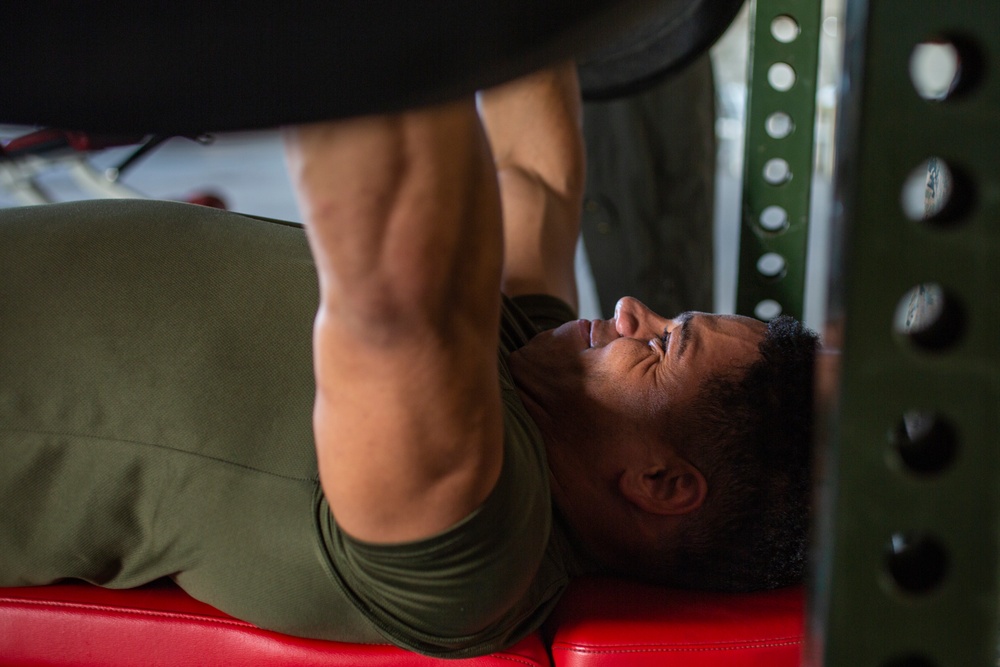U.S. Marines, Sailors participate in a bench press competition during exercise KAMANDAG 3