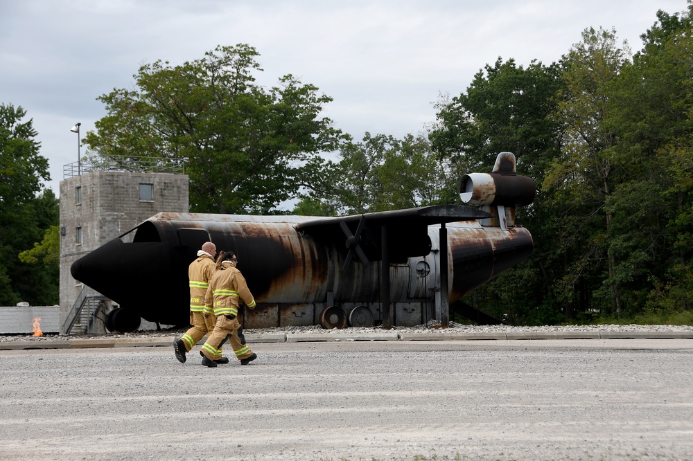 178 CES firefighters practice putting out airplane fires