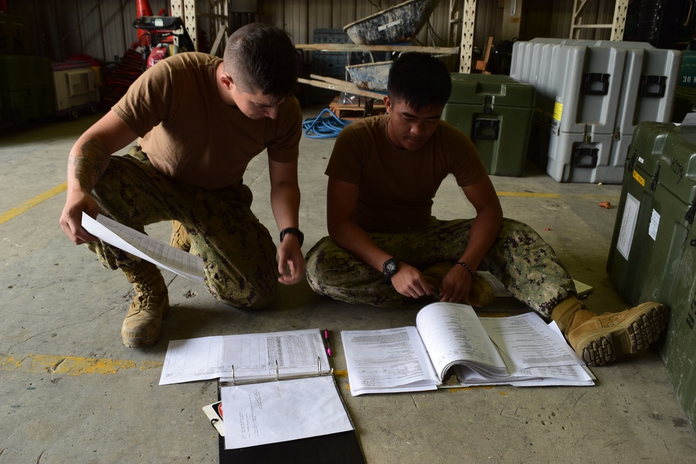 NMCB-5 and NMCB-4's Detail Iwakuni Seabees, deployed to Marine Corps Air Station Iwakuni, perform turnover