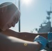 U.S. Sailor greases pyrotechnics locker