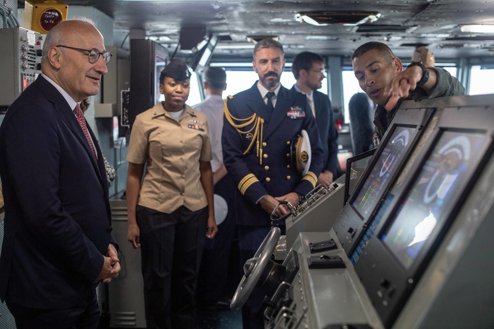 U.S. Navy Cmdr. Michael Moreno, right, the navigation officer of the aircraft carrier USS John C. Stennis (CVN 74), briefs His Excellency Philippe Etienne, left, Ambassador of France to the U.S., on the bridge