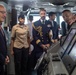 U.S. Navy Cmdr. Michael Moreno, right, the navigation officer of the aircraft carrier USS John C. Stennis (CVN 74), briefs His Excellency Philippe Etienne, left, Ambassador of France to the U.S., on the bridge