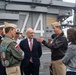 U.S. Navy Capt. J. Patrick Thompson, center right, executive officer of the aircraft carrier USS John C. Stennis