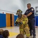 Firefighters teach fire prevention to students through song and dance