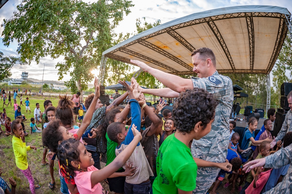 High fiving in Papua New Guinea