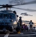 An HH-60 Pave Hawk from the U.S. Air Force’s 33rd Rescue Squadron Conducts Deck Landing Qualifications aboard USS Milius (DDG 69)