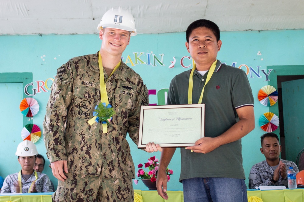 NMCB-5 attends the Sama Sama Children's Learning Center groundbreaking ceremony at Kamuing Elementary School in Palawan, Philippines
