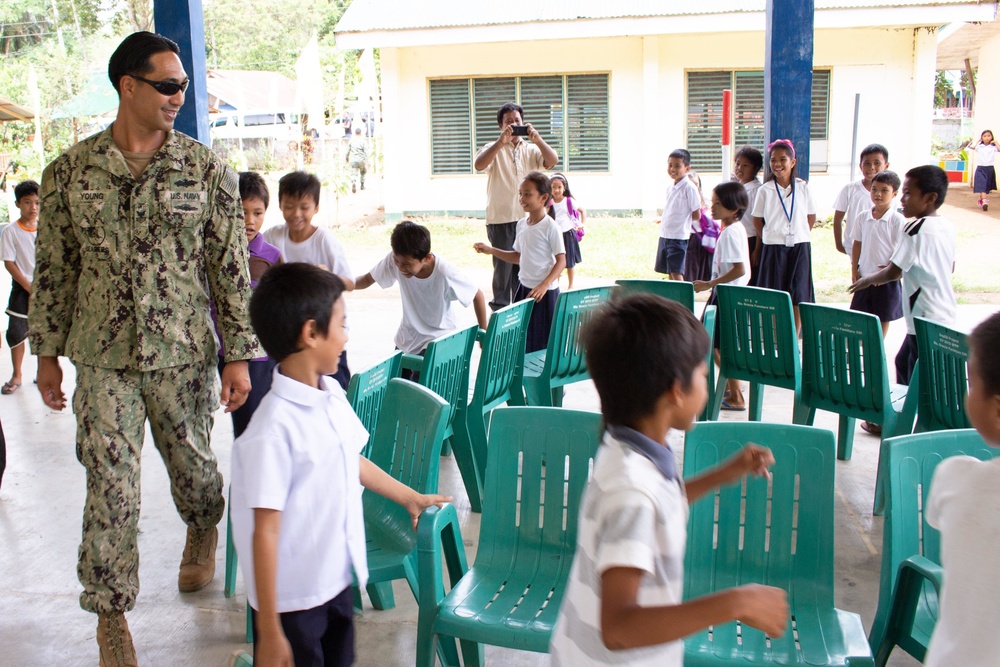 NMCB-5 attends the Sama Sama Children's Learning Center groundbreaking ceremony at Kamuing Elementary School in Palawan, Philippines