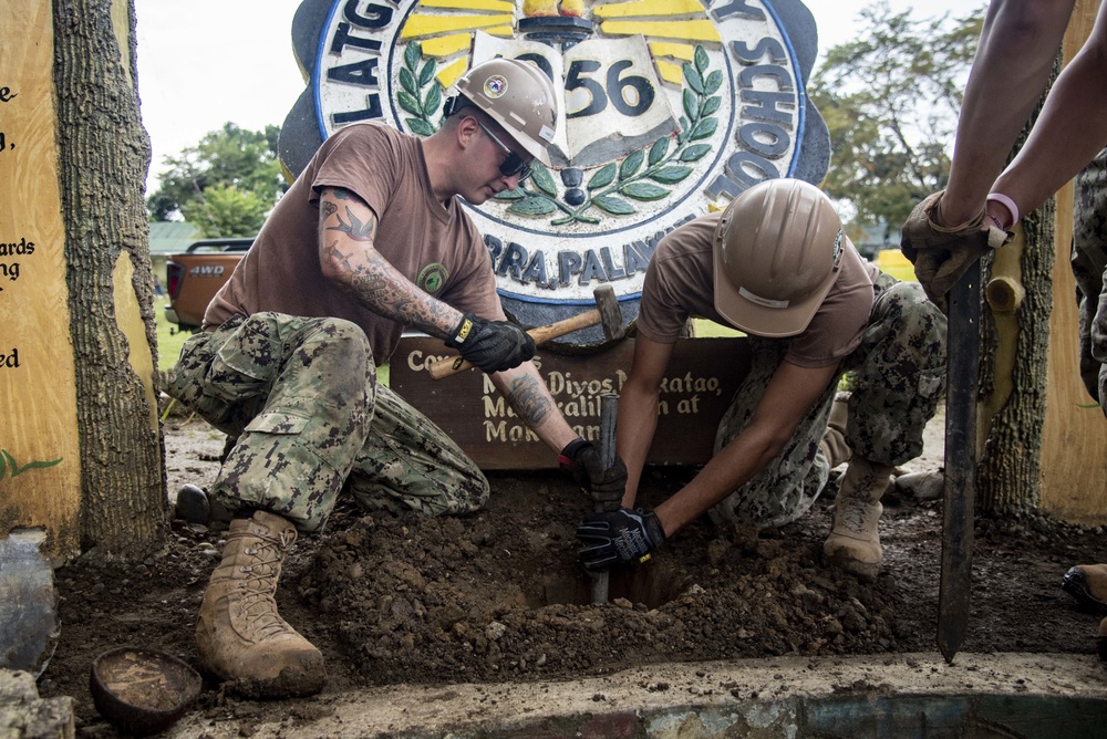 NMCB-5’s Detail Palawan celebrate at the ground breaking ceremony at Malatgao Elementary School