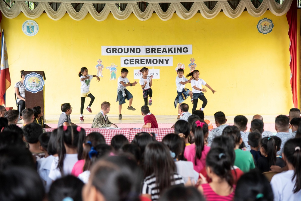 NMCB-5’s Detail Palawan celebrate at the ground breaking ceremony at Malatgao Elementary School