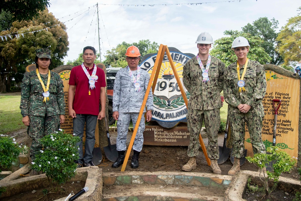 NMCB-5’s Detail Palawan celebrate at the ground breaking ceremony at Malatgao Elementary School