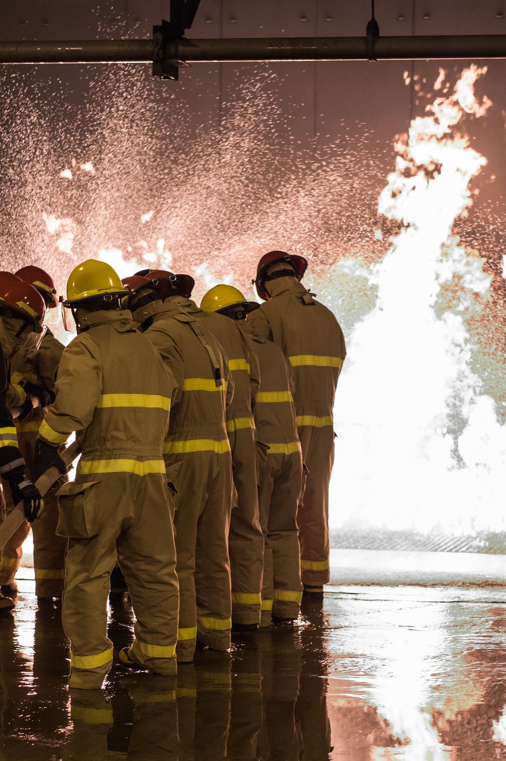 191024-N-TE695-0007 NEWPORT, R.I. (Oct. 24, 2019) -- Navy Officer Candidate School class conducts firefighting training