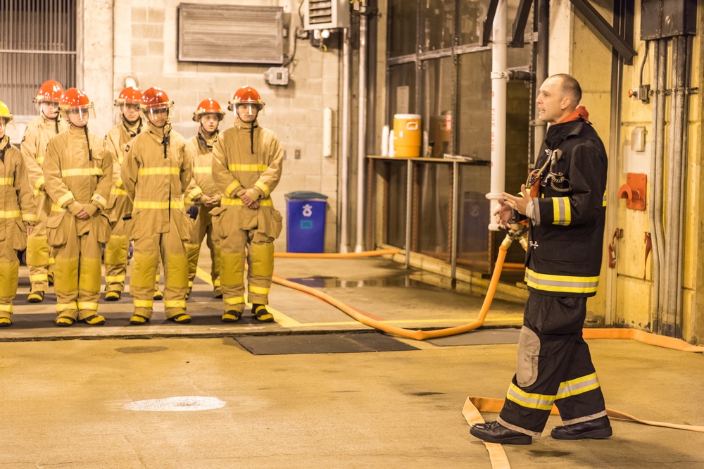 191024-N-TE695-0003 NEWPORT, R.I. (Oct. 24, 2019) -- Navy Officer Candidate School class conducts firefighting training