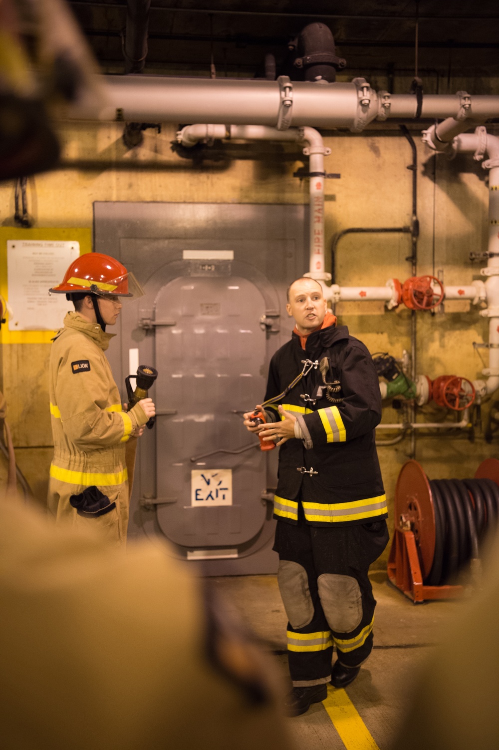 191024-N-TE695-0004 NEWPORT, R.I. (Oct. 24, 2019) -- Navy Officer Candidate School class conducts firefighting training