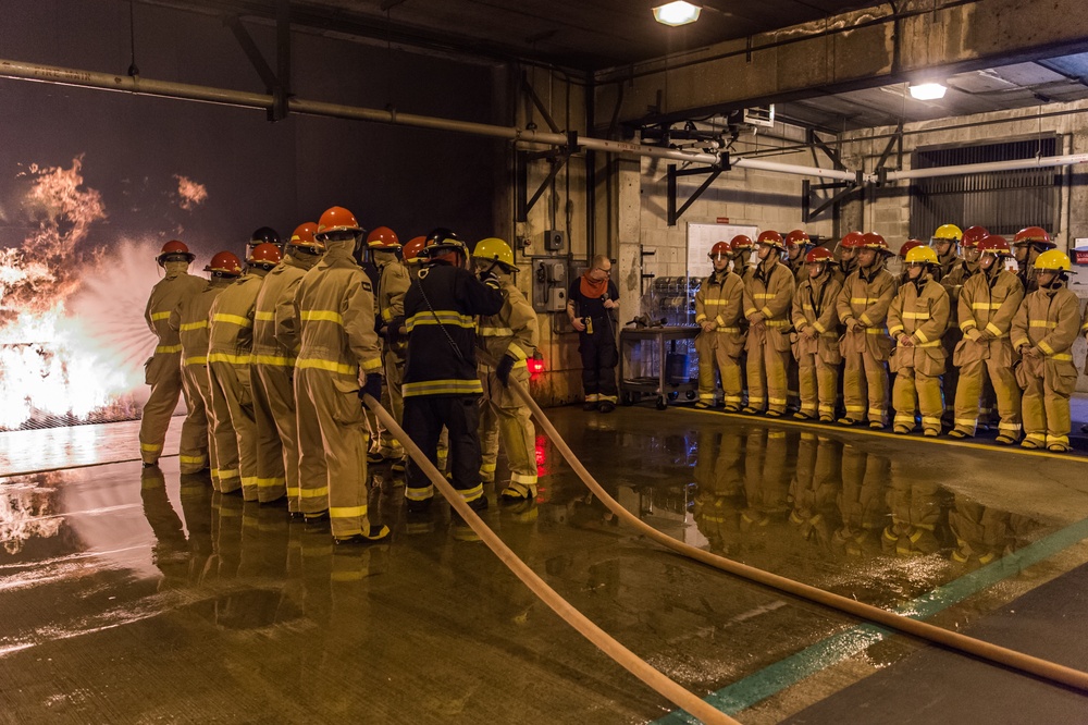 191024-N-TE695-0008 NEWPORT, R.I. (Oct. 24, 2019) -- Navy Officer Candidate School class conducts firefighting training