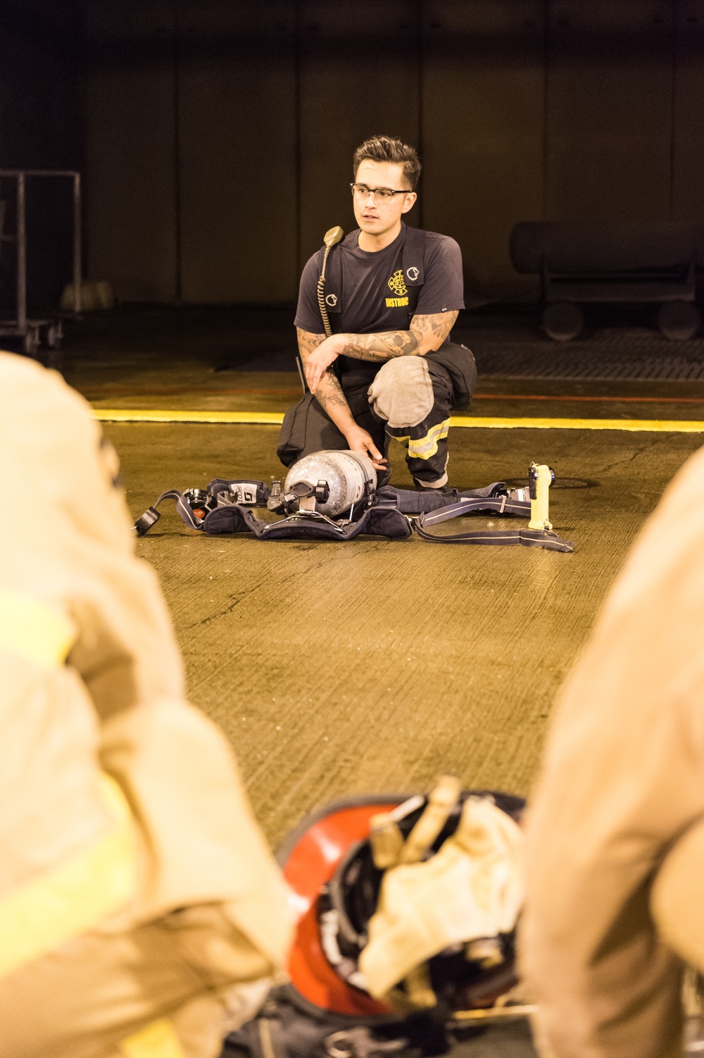 191024-N-TE695-0017 NEWPORT, R.I. (Oct. 24, 2019) -- Navy Officer Candidate School class conducts firefighting training