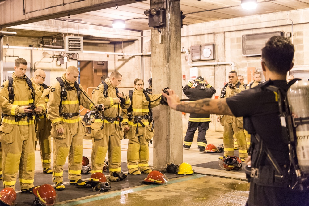 191024-N-TE695-0018 NEWPORT, R.I. (Oct. 24, 2019) -- Navy Officer Candidate School class conducts firefighting training