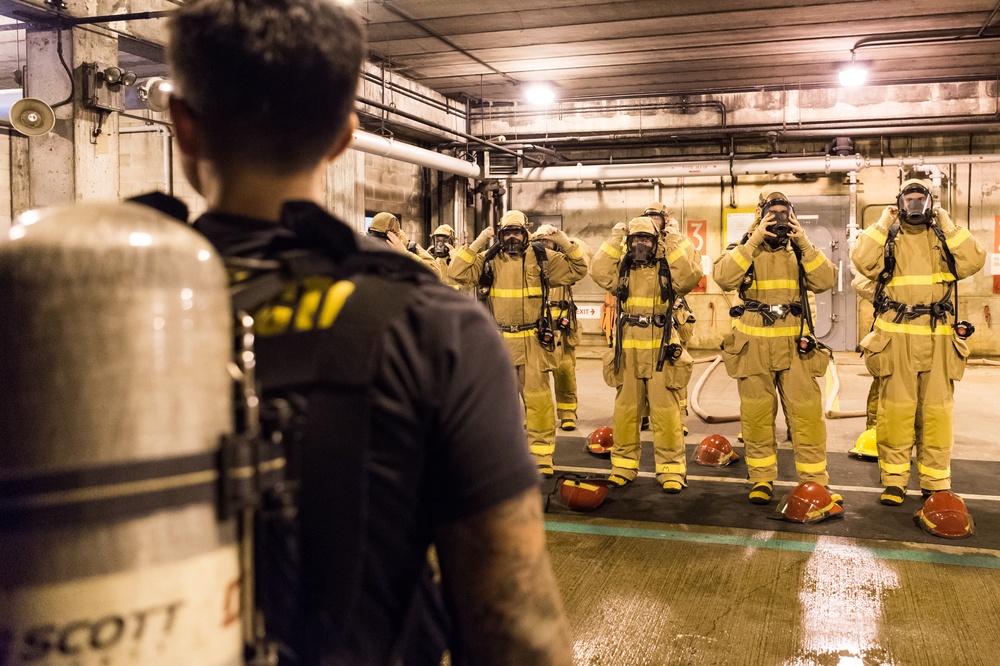 191024-N-TE695-0019 NEWPORT, R.I. (Oct. 24, 2019) -- Navy Officer Candidate School class conducts firefighting training