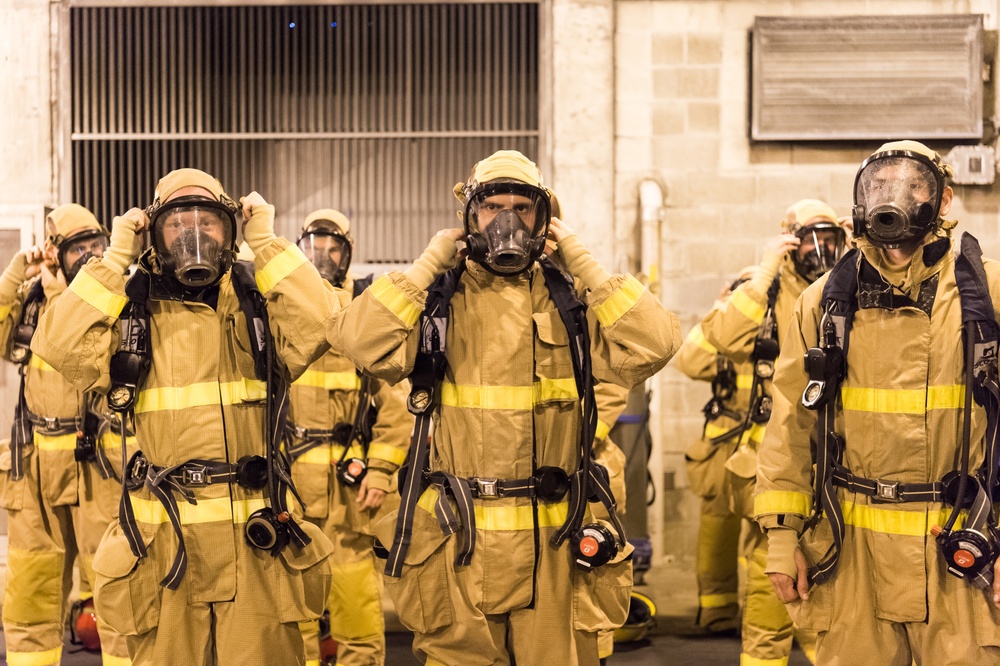 191024-N-TE695-0020 NEWPORT, R.I. (Oct. 24, 2019) -- Navy Officer Candidate School class conducts firefighting training