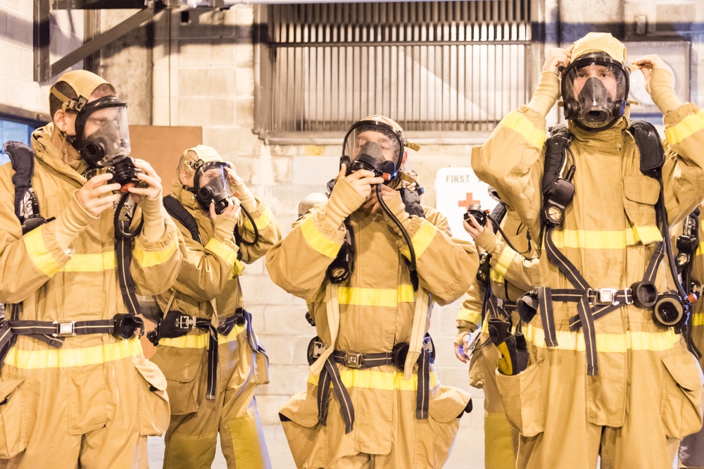 191024-N-TE695-0024 NEWPORT, R.I. (Oct. 24, 2019) -- Navy Officer Candidate School class conducts firefighting training