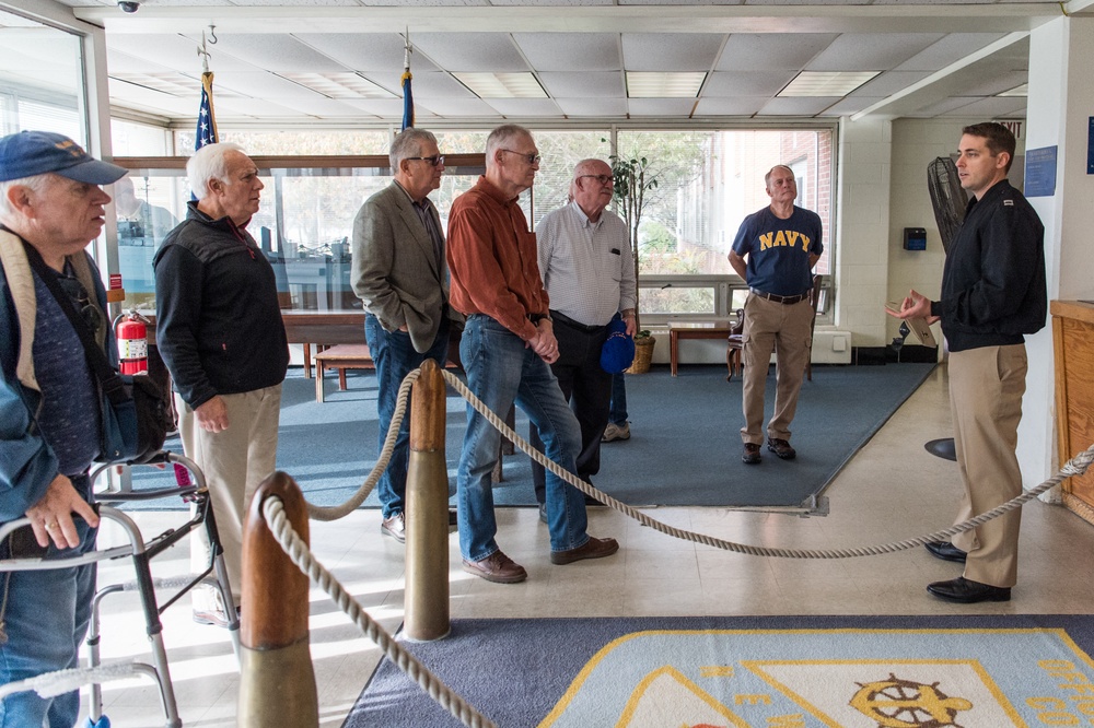 191025-N-TE695-0008 NEWPORT, R.I. (Oct. 25, 2019) -- Navy Officer Candidate School graduates from 1969 visits Officer Training Command