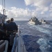 USS Antietam (CG 54) conducts replenishment-at-sea with USNS Washington Chambers (T-AKE 11)