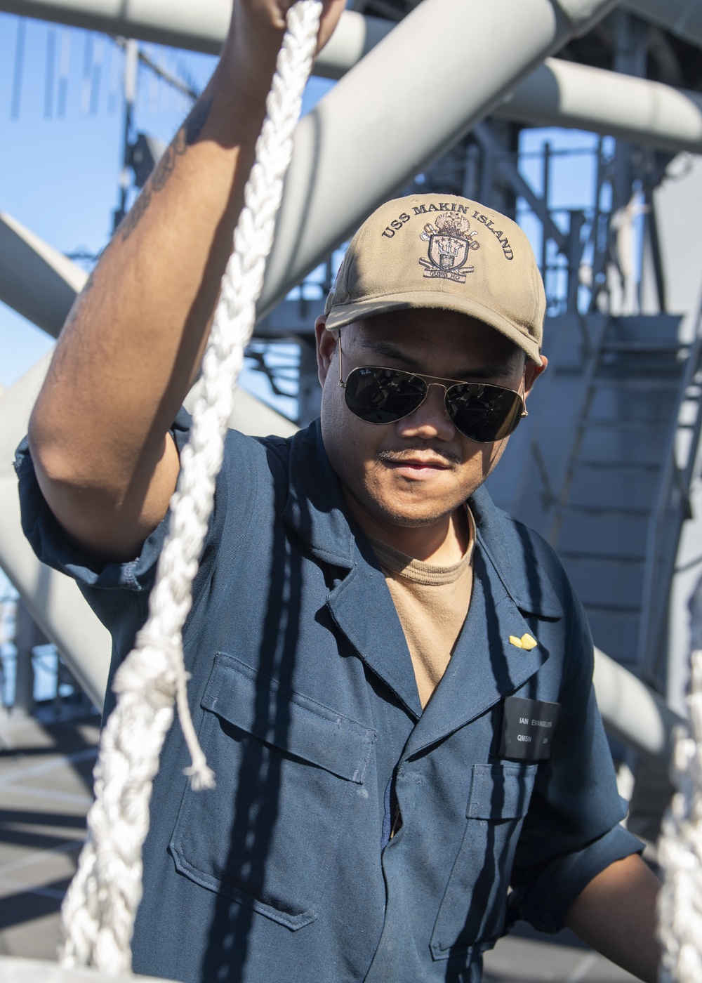 USS Makin Island Quartermasters Hoist Flags