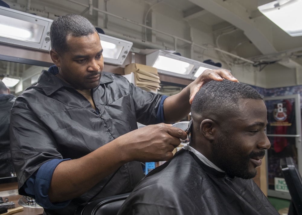 USS Makin Island Sailors Provide Haircuts to the Crew